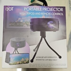 Nwt Cellphone Portable Projector with Tripod and Remote